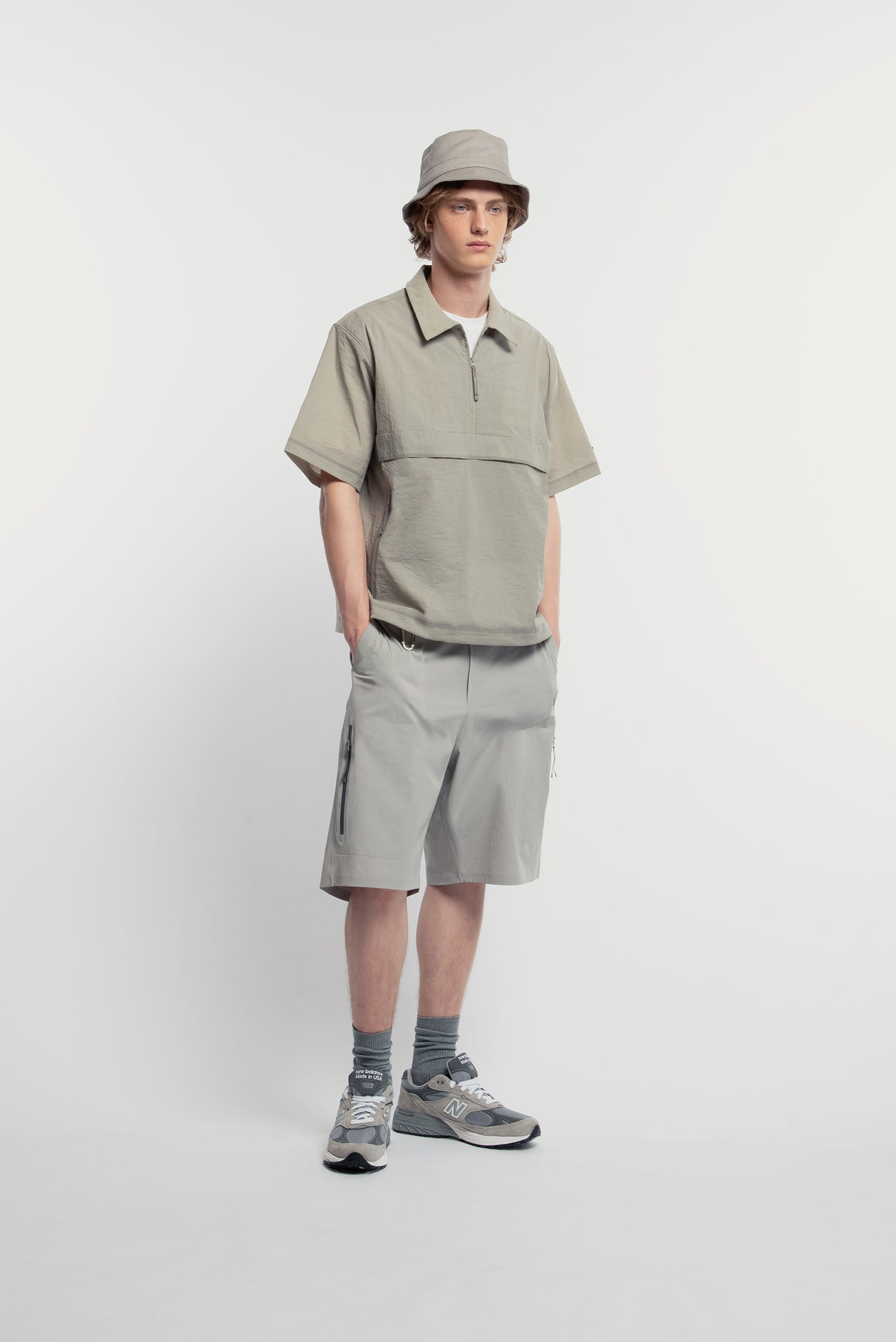 UNISEX TECHNICAL HALF ZIP POLO