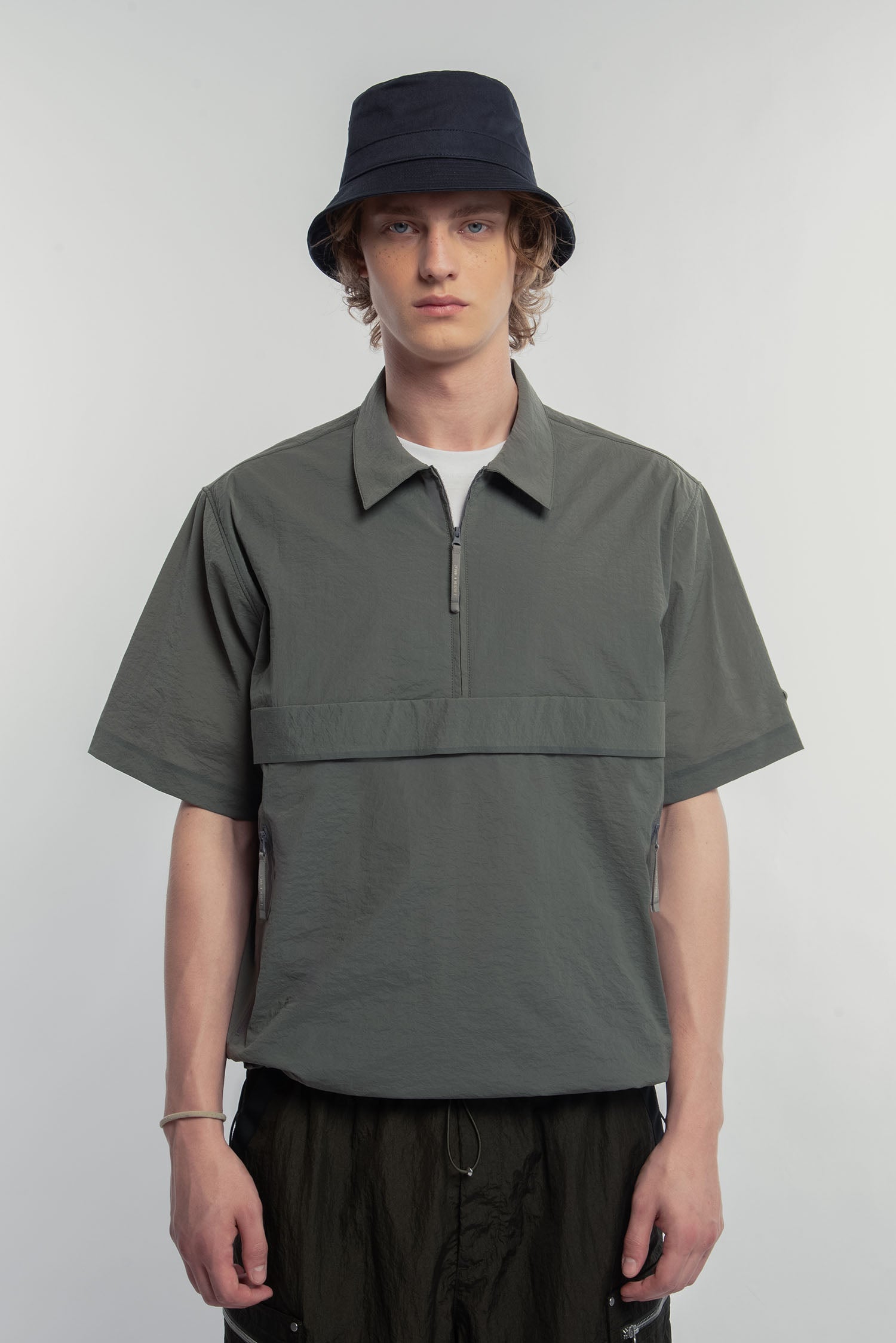 UNISEX TECHNICAL HALF ZIP POLO