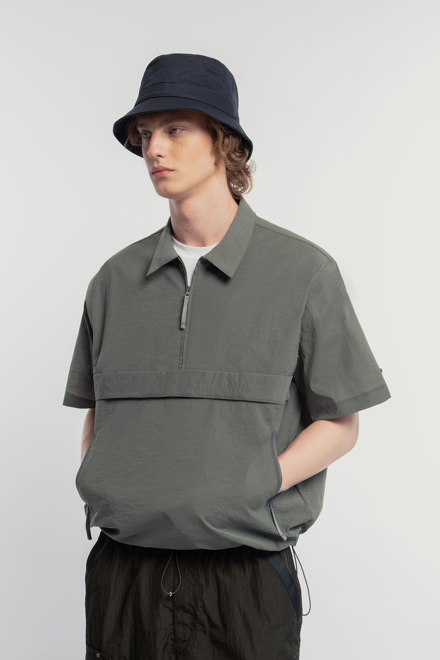 UNISEX TECHNICAL HALF ZIP POLO