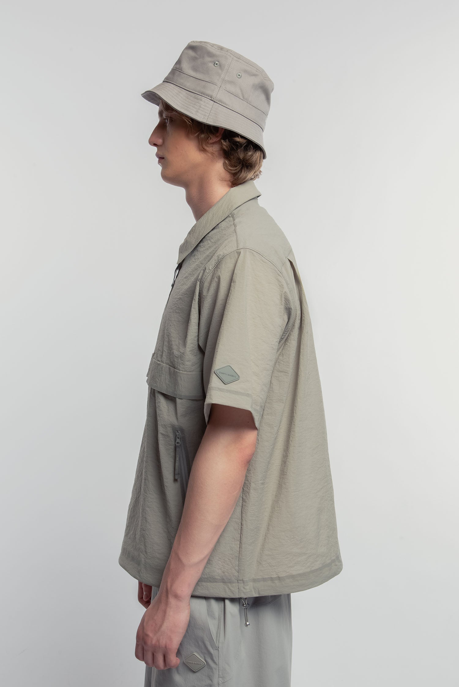 UNISEX TECHNICAL HALF ZIP POLO
