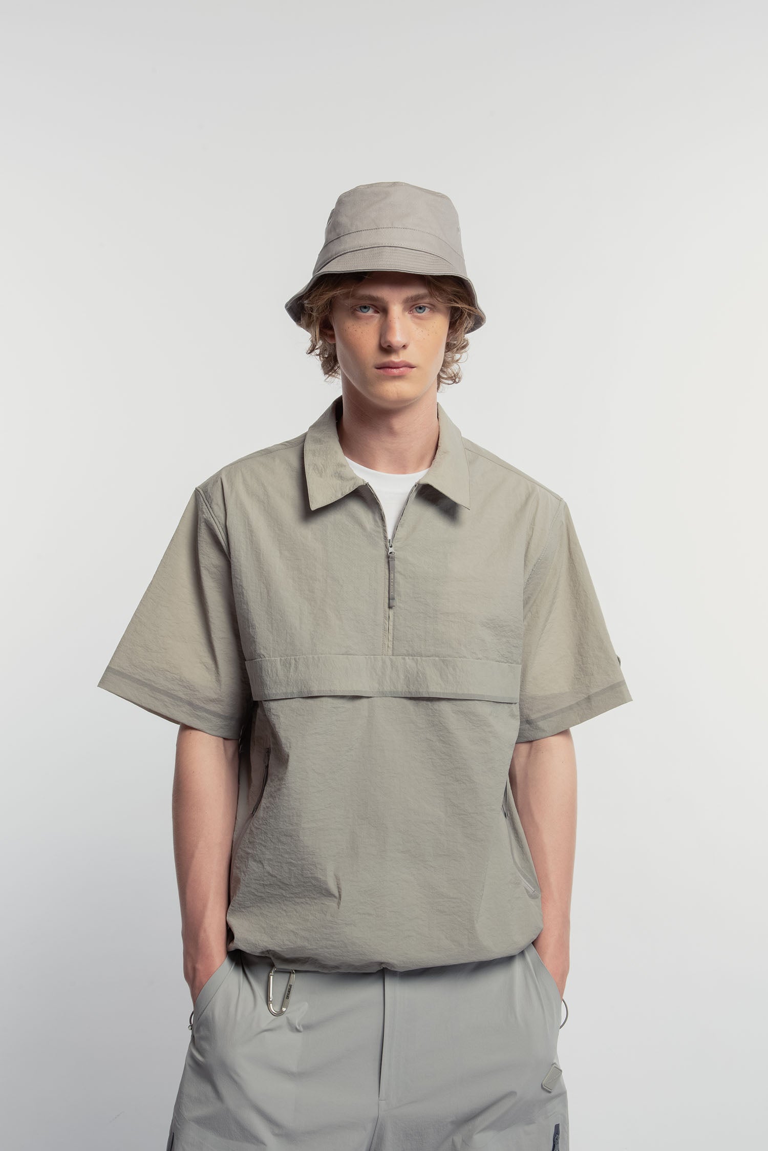 UNISEX TECHNICAL HALF ZIP POLO