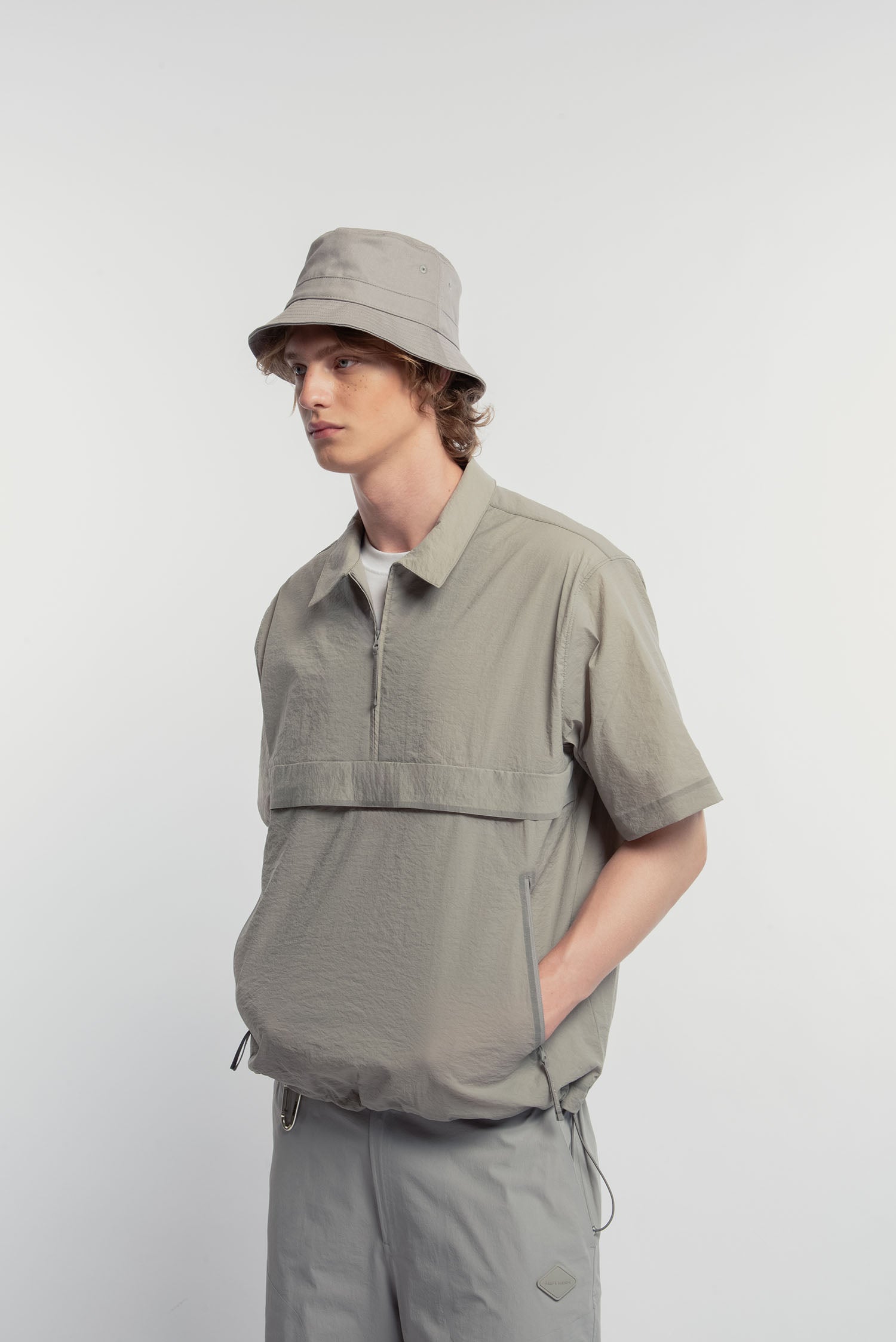 UNISEX TECHNICAL HALF ZIP POLO