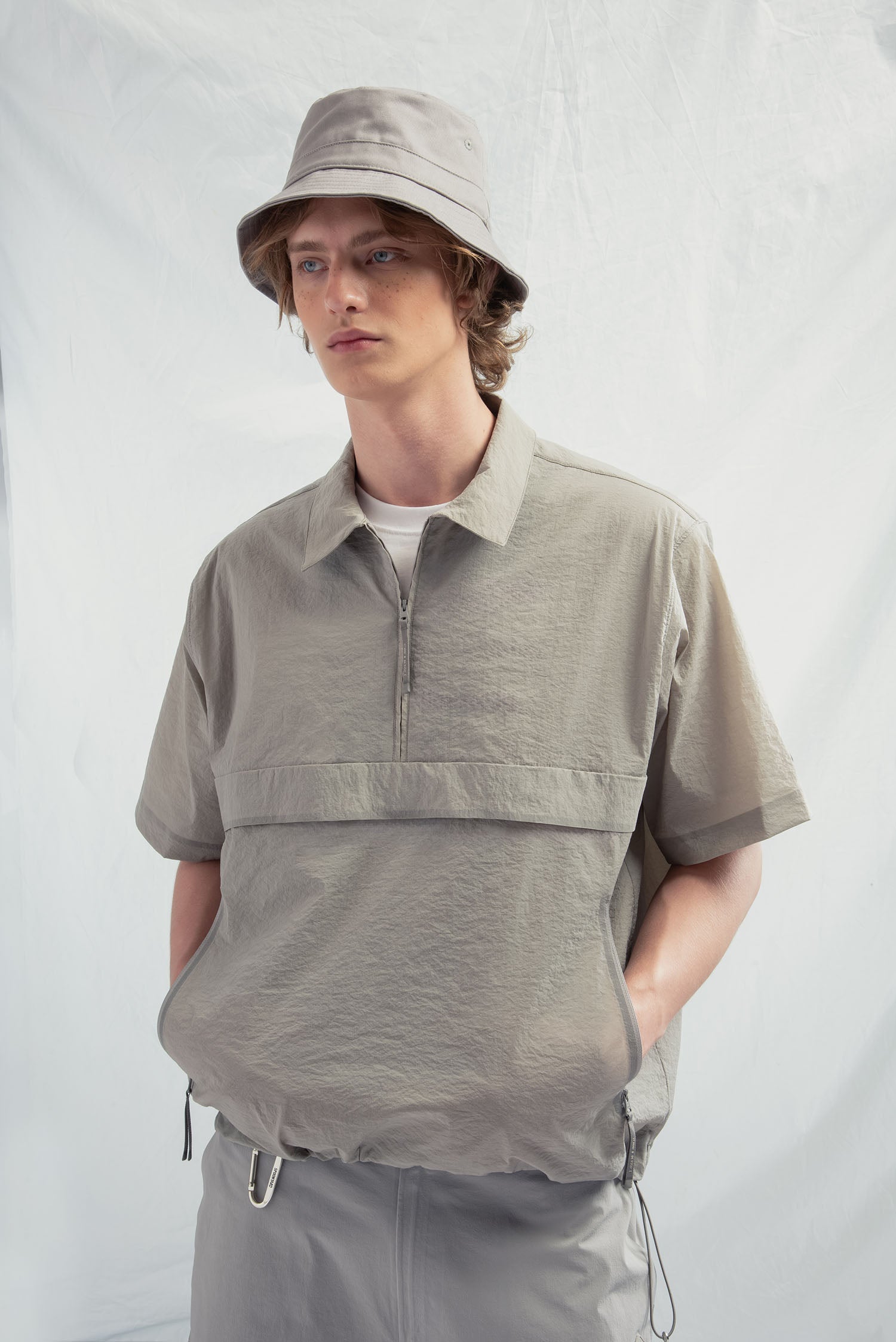 UNISEX TECHNICAL HALF ZIP POLO