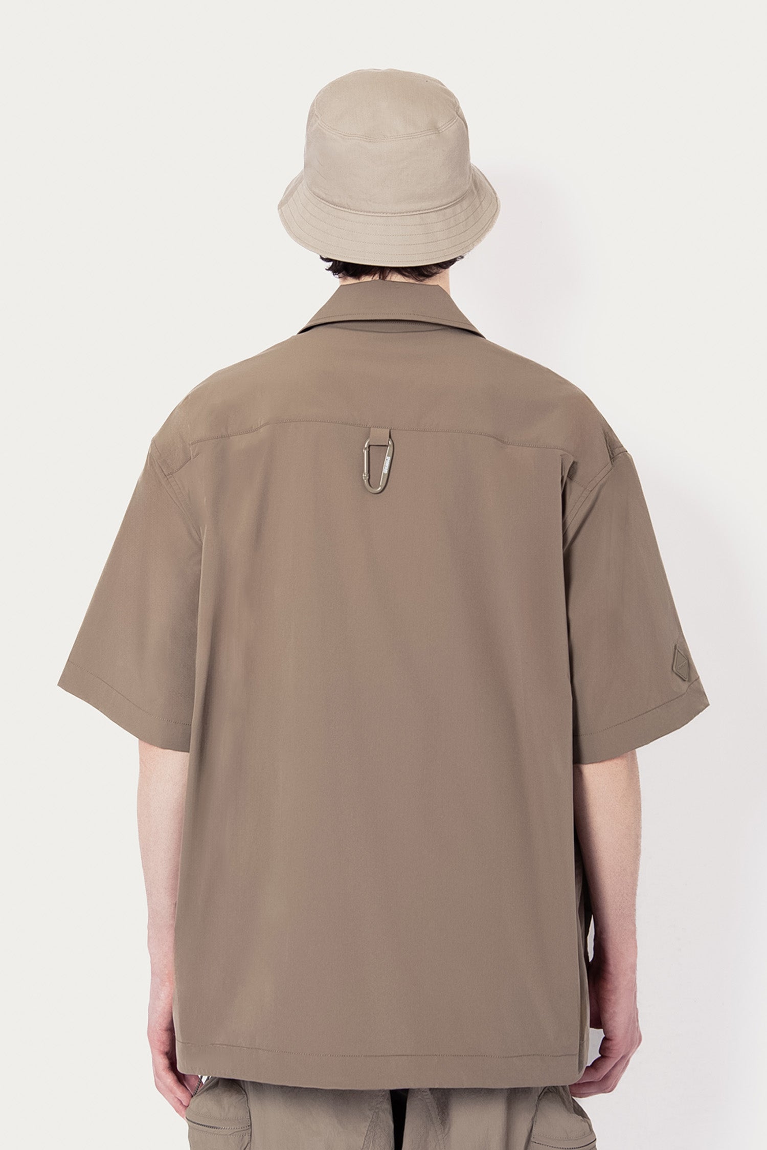 UNISEX SOLOTEX® PACKABLE HALF ZIP POLO